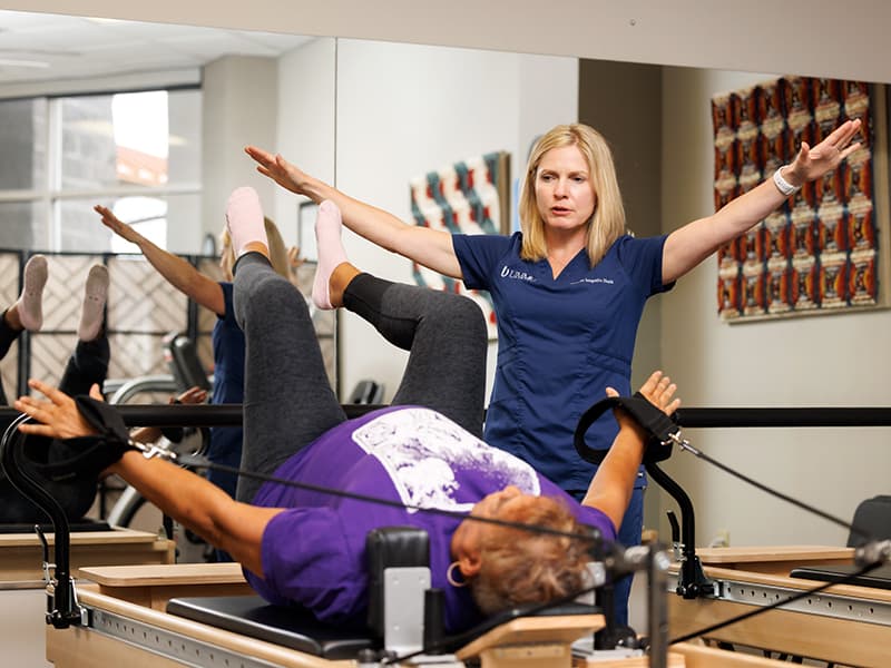 UMMC Center for Integrative Health physical therapist Rachel Dear works with patient Linda Goodrich of Byram.